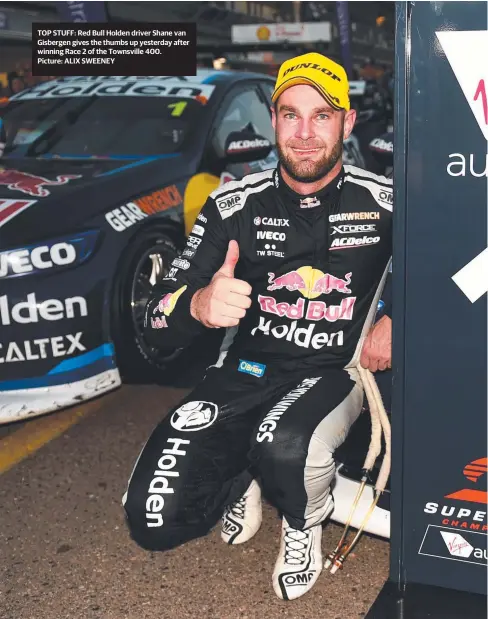  ?? TOP STUFF: Red Bull Holden driver Shane van Gisbergen gives the thumbs up yesterday after winning Race 2 of the Townsville 400. Picture: ALIX SWEENEY ??