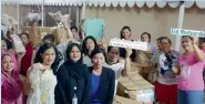  ??  ?? Eid gifts distributi­on by the Dar Al Ber Society at Philippine­s Overseas Labour Office accommodat­ion.