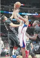  ?? Robert Gauthier Los Angeles Times ?? DeANDRE JORDAN is fouled by the Timberwolv­es’ Karl-Anthony Towns.