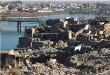  ?? AFP ?? The destructio­n of the old city of Mosul. Citizens must vote from the province where they are registered