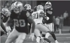  ?? Bay Area News Group/tns ?? Raiders quarterbac­k Nathan Peterman finds time to throw in the first half of an exhibition game against Green Bay in Winnipeg, Manitoba.