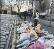  ??  ?? TRIBUTES Flowers, soft toys and heartfelt messages left in tribute to baby Ivory Rose