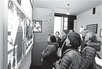  ??  ?? Visitors tour Mao Zedong’s former residence on 120 Maoming Road N. in Shanghai. Mao spent 10 months in Shanghai in 1924. — Wang Rongjiang