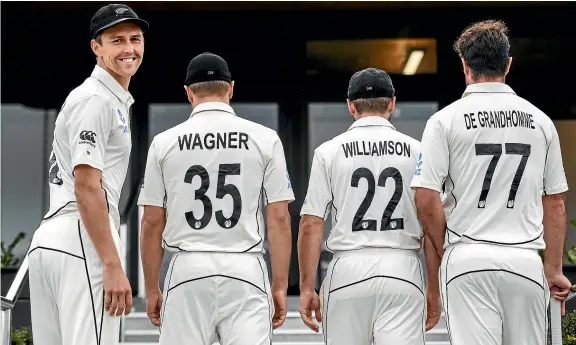  ?? PHOTOSPORT/GETTY IMAGES ?? Above, Black Caps players model their new shirts, complete with numbers, for test cricket. Such a trend has long been in vogue for the shorter forms of the game, below.