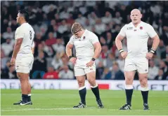  ??  ?? England players Billy Vunipola (left), Tom Youngs and Dan Cole are downcast after their 28-25 loss to Wales at Twickenham. PHOTO: GETTY IMAGES