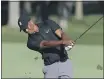  ?? DARRON CUMMINGS — THE ASSOCIATED
PRESS ?? Tiger Woods hits from the 13th fairway during a practice round for the Memorial tournament on Tuesday in Dublin, Ohio.