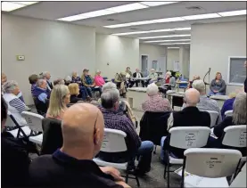  ?? kevin Myrick ?? The meeting room above the Polk County Historical Society museum in Cedartown was filled with members eager to hear from Polk County Coroner Tony Brazier on the history of the county’s ambulance service.