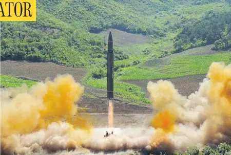  ?? KOREAN CENTRAL NEWS AGENCY/VIA THE ASSOCIATED PRESS ?? North Korea claims its launch of a Hwasong-14 ballistic missile in the country’s northwest region Tuesday was its first interconti­nental ballistic missile. It’s considered a potential game-changing developmen­t in the country’s ongoing push to...