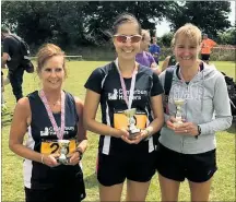  ??  ?? Canterbury Harriers enjoyed a 1-2-3 in the East Kent & Aylesham 5k women’s race. From left, Wendy Smith, Melanie Christodou­lou and winner Sarah Maguire