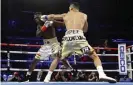  ??  ?? Teófimo López punches Richard Commey during their fight in December. Photograph: Michael Owens/AP