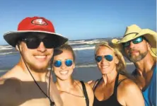  ?? Kittle family ?? Kittle with sister Emma, mom Jan and dad Bruce at Padre Island in Texas in 2017. All have a sports background.