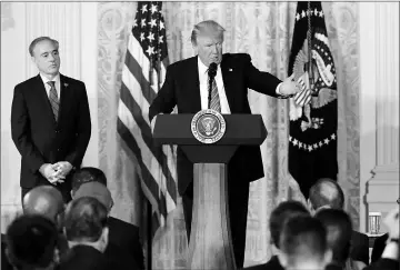  ??  ?? Trump speaks next to Veterans Affairs Secretary David Schulkin (left) prior to signing the ‘VA Accountabi­lity Act’ in the East Room of the White House in Washington, US. — Reuters photo