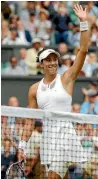  ?? ALASTAIR GRANT/REUTERS ?? Garbine Muguruza has won her second grand slam title.