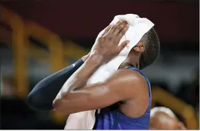  ?? CHARLIE NEIBERGALL — THE ASSOCIATED PRESS ?? Bam Adebayo reacts at the end of the United States’ loss to France on July 25.