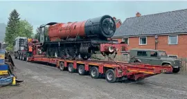  ?? QUENTIN MCGUINNESS ?? Unrestored GWR 4-6-0 No. 5952 Cogan Hall leaves Llangollen for Tyseley Locomotive Works on June 28.