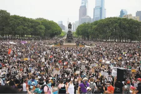  ?? Tyger Williams / Philadelph­ia Inquirer ?? Throngs of people gather along the steps of the Philadelph­ia Art Museum and Eakins Oval during a protest against injustice.