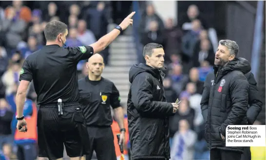  ??  ?? Seeing red Boss Stephen Robinson joins Carl Mchugh in the Ibrox stands