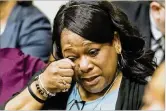  ??  ?? Carolyn Baylor Giummo, mother of the slain Anthony Hill, reacts Monday to the verdict in ex-DeKalb County police Officer Robert Olsen’s trial in Decatur.