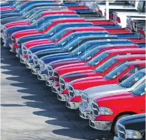  ?? JOHN BAZEMORE/THE ASSOCIATED PRESS FILE ?? This is one of the best times of year to go truck shopping, with automakers offering discounts to get vehicles off the lot in order to make room for 2018 models.