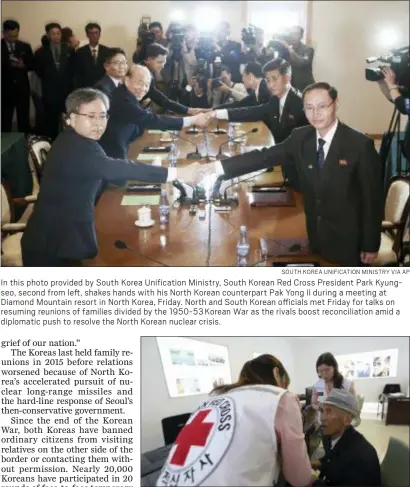  ?? SOUTH KOREA UNIFICATIO­N MINISTRY VIA AP ?? In this photo provided by South Korea Unificatio­n Ministry, South Korean Red Cross President Park Kyungseo, second from left, shakes hands with his North Korean counterpar­t Pak Yong Il during a meeting at Diamond Mountain resort in North Korea, Friday....