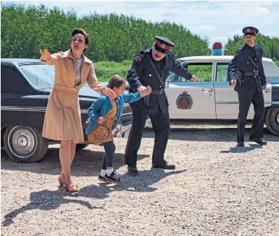  ?? BELL MEDIA ?? Police and a social worker remove Bezhig Little Bird (Keris Hope Hill) from her home in a scene from “Little Bird.”