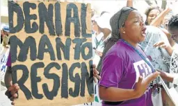  ?? Picture: GALLO IMAGES ?? GET OUT: Treatment Action Campaign members protested against a cohort of Thabo Mbeki’s denialism, former health minister Manto Tshabalala-Msimang