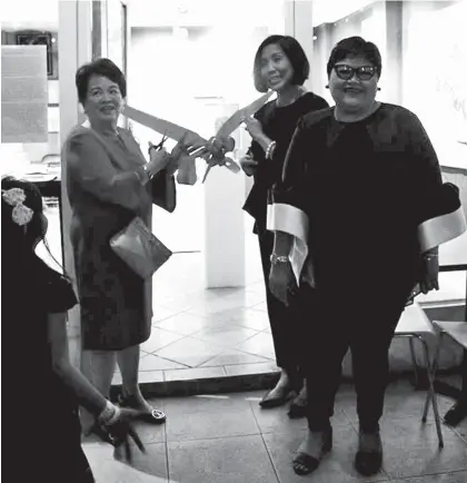  ??  ?? FORMAL OPENING. Cutting the ribbon are Dr. Nina's mother Dr. Joyce S. Custodio and Dr. Lourdes Ledesma, also an OB-Gyne.