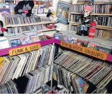  ??  ?? Some of many thousands of records and CDs in Custard Cube before stock was seized