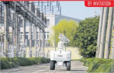  ??  ?? A robot inspects power equipment at an electrical substation of the State Grid Corporatio­n of China in Jiaxing in Zhejiang province. BY INVITATION