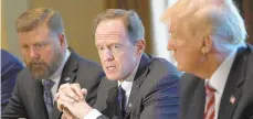  ?? ALEX WONG/GETTY IMAGES ?? U.S. Sen. Pat Toomey, center, R-Pa., speaks as President Donald Trump listens during a meeting with members of Congress in the Cabinet Room of the White House last year in Washington. Toomey on Monday criticized Trump’s decision to pull back troops from northern Syria. Republican U.S. Rep. Brian Fitzpatric­k joined in.