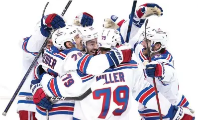  ?? AP Photo/gene J. Puskar ?? New York Rangers’ Chris Kreider (20) celebrates his goal Friday during the third period in Game 6 of an NHL hockey Stanley Cup first-round playoff series against the Pittsburgh Penguins in Pittsburgh.