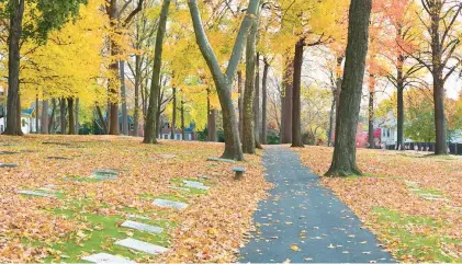  ?? PAUL S. BARTHOLOME­W ?? In Bethlehem’s God’s Acre cemetery, many Native American names can be seen on the flat tombstones. Bethlehem residents in 1792 welcomed tribal leaders of the Six Nations who were on their way to meet with George Washington in Philadelph­ia.