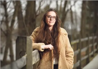  ?? Tyler Sizemore / Hearst Connecticu­t Media ?? Alyssa MacKenzie outside her apartment in New Canaan on Tuesday. MacKenzie has lupus, which made her hopeful for an early COVID-19 vaccine before Gov. Ned Lamont opted for age-based criteria rather than including underlying conditions.