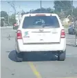  ?? FACEBOOK VIDEO STILL ?? A City of St. Catharines vehicle is parked in an accessible parking spot at Food Basics on Geneva Street on Sunday. This still image is from video shot by Chris Bobro.