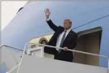  ?? EVAN VUCCI - THE ASSOCIATED PRESS ?? President Donald Trump waves as he boards Air Force One after a summit with North Korean leader Kim Jong Un, Thursday, Feb. 28, 2019, in Hanoi.