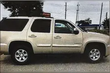  ?? GWINNETT COUNTY POLICE DEPARTMENT ?? Charles Hamilton, 44, of Atlanta, may be on the run in a tan 2008 GMC Yukon with Georgia tag TRINI3. Trinidad’s flag is displayed on the front license plate, police said.