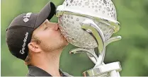  ??  ?? DEAN Burmester kissing the Tshwane Open trophy, his first European Tour title. | sunshineto­ur.com