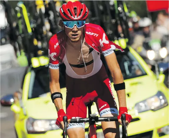  ?? — GETTY IMAGES ?? Ilnur Zakarin of Russia, competing for Team Katusha, rides up the final climb to win Stage 17 of the Tour de France on Wednesday, a 184.5-kilometre stage from Berne to Finhaut-Emosson, Switzerlan­d. It was the first of the Tour’s four legs in the Alps.