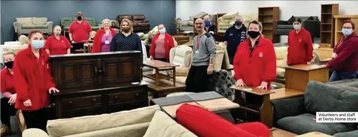  ??  ?? Volunteers and staff at Derby Home store