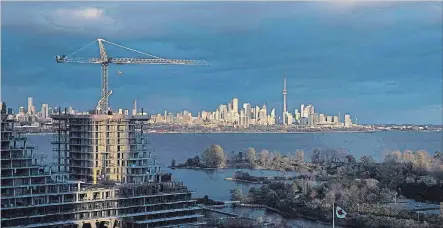  ?? MARK BLINCH THE CANADIAN PRESS ?? Home sales in Toronto and the GTA saw a small uptick in January, a sign that the real estate market in Canada's largest city remains stable.