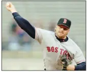  ?? AP file photo ?? Boston pitcher Roger Clemens tied his major-league record with 20 strikeouts on this date in 1996, pitching a four-hitter to lead the Red Sox to a 4-0 victory over the Detroit Tigers.