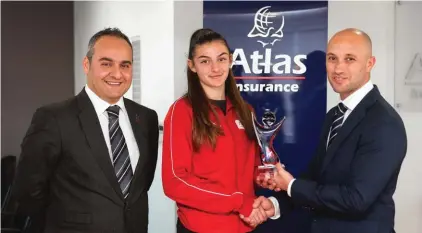  ??  ?? Rachela Pace receiving the Atlas Youth Athlete of the Month Award for January 2020 from David Cassar and Sandro Micallef