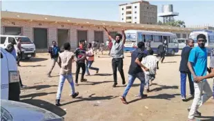  ?? Agence France-presse ?? Anti-government demonstrat­ors shout slogans in Khartoum on Sunday.