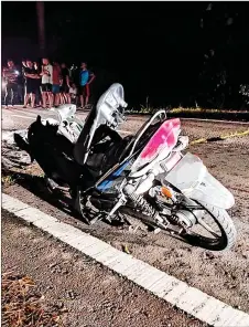  ?? ?? The damaged motorcycle at the scene of the accident.