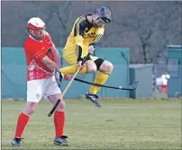  ??  ?? An unorthodox attempt at a block as Inveraray’s Nicholas Crawford challenges Dougie Rankin from Inverness. Inveraray won by the odd goal in three.