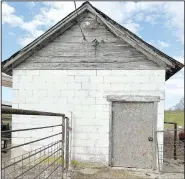  ?? (NWA Democrat-Gazette/Lynn Kutter) ?? This building is the original milking barn for Hillian Ranch off Highway 16 in Washington County. Ivan McFarland started the farm in the 1930s and 1940s. Hillian Ranch is a fifth-generation farm that now is owned by Michael and Melinda Hillian.