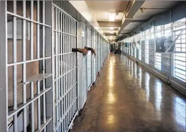  ?? Giles Clarke Getty Images ?? AN ANAHEIM company faces criticism for its role in a partnershi­p with the Louisiana correction­s department to use inmates at the Angola penitentia­ry as human guinea pigs in an addiction treatment program.