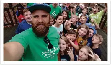  ?? ?? Pictured above: Campers and counselors at Camp Echo Rock capture the summer fun with a selfie. Contribute­d photo.