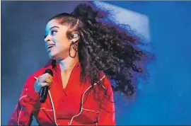  ??  ?? ELLA MAI, whose single “Boo’d Up” recently went platinum, deserved better than an abbreviate­d performanc­e on a side stage at Sunday’s BET awards show.
