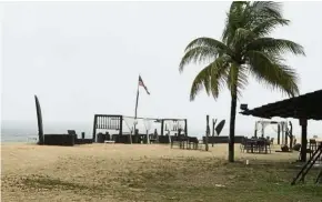  ??  ?? Some seaside resorts are forced to close during the rainy seasons. — Photos: CHESTER CHIN/The Star